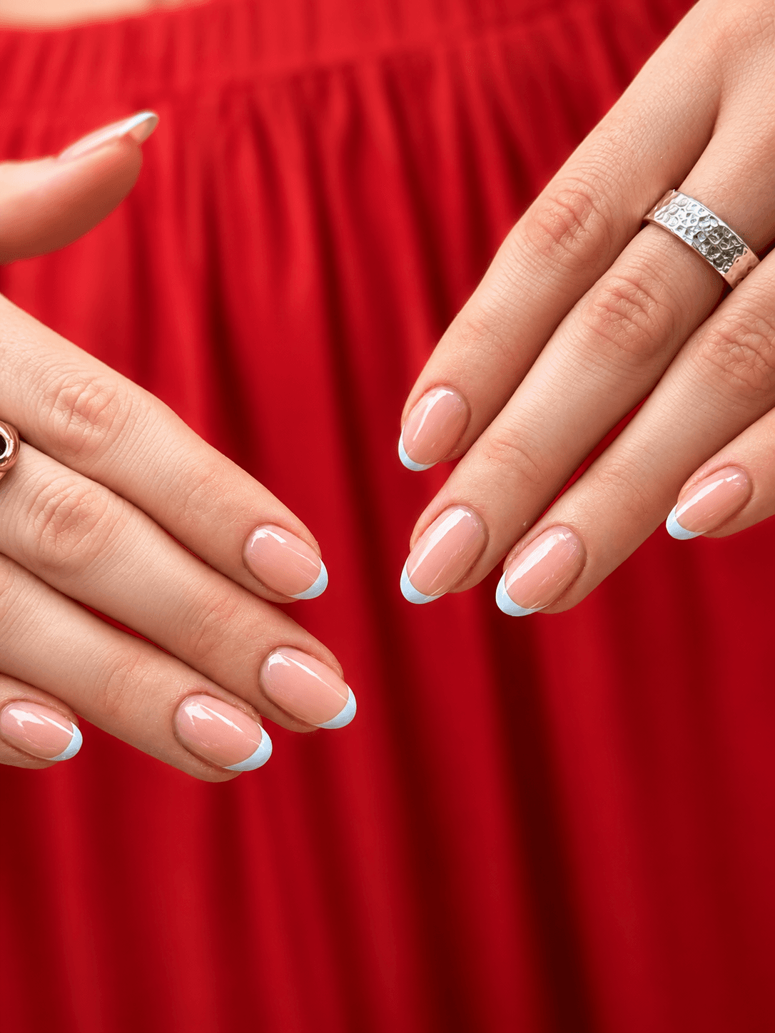 Natural pink nails with crisp pale blue French tips